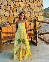 Vestido Cítrus da Areia Crôa, vestido feminino com estampa vibrante, mostrado em uma modelo usando na imagem.